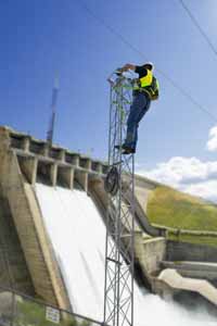 Employee Installing Cameras on Security Tower at Folsom Dam